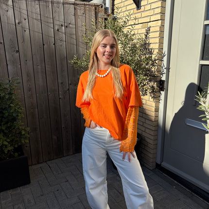  - Hanna longsleeve oranje - Your Style Fashion