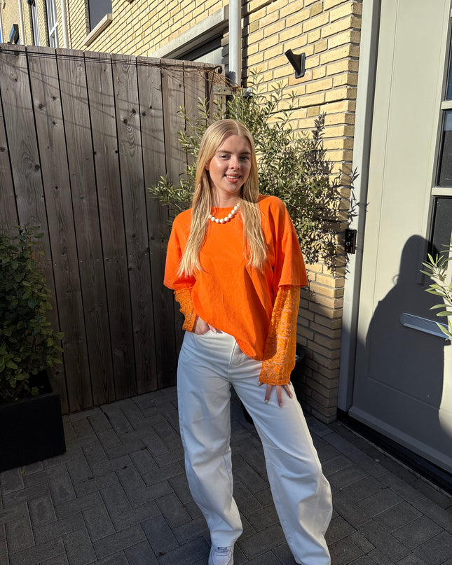  - Hanna longsleeve oranje - Your Style Fashion