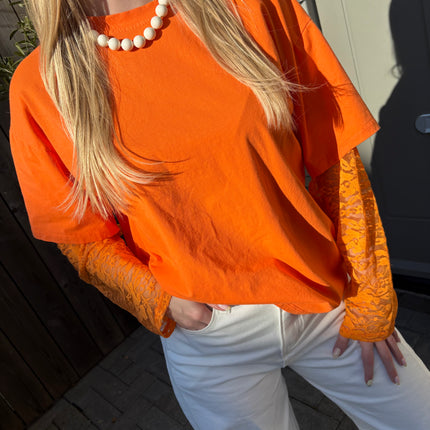  - Hanna longsleeve oranje - Your Style Fashion