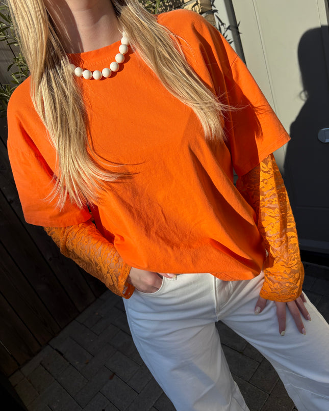  - Hanna longsleeve oranje - Your Style Fashion
